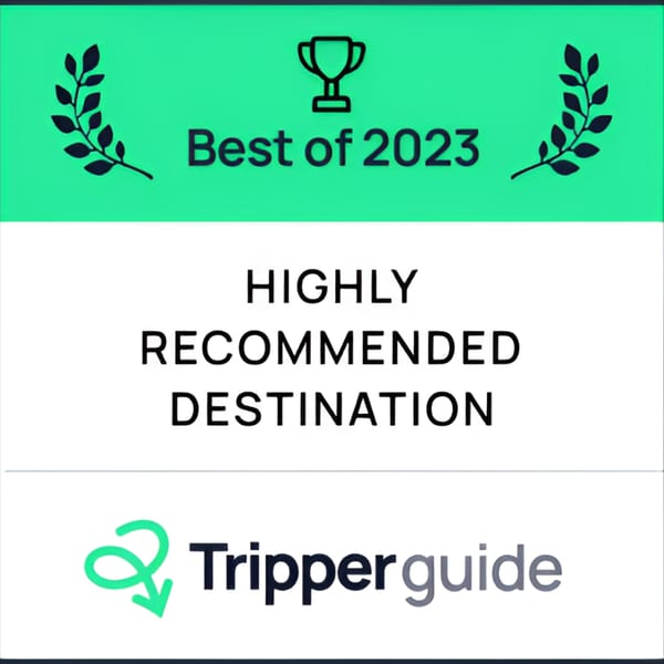 Tripperguide award badge for Monica's Trattoria: "Best of 2023, Highly Recommended Destination".
