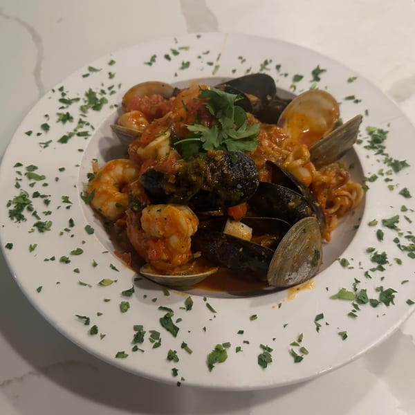 Monica's Trattoria's seafood pasta with mussels, clams, shrimp, and calamari in red sauce.