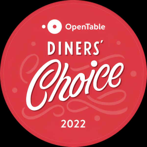 Red circular OpenTable Diners' Choice 2022 award badge with white text.